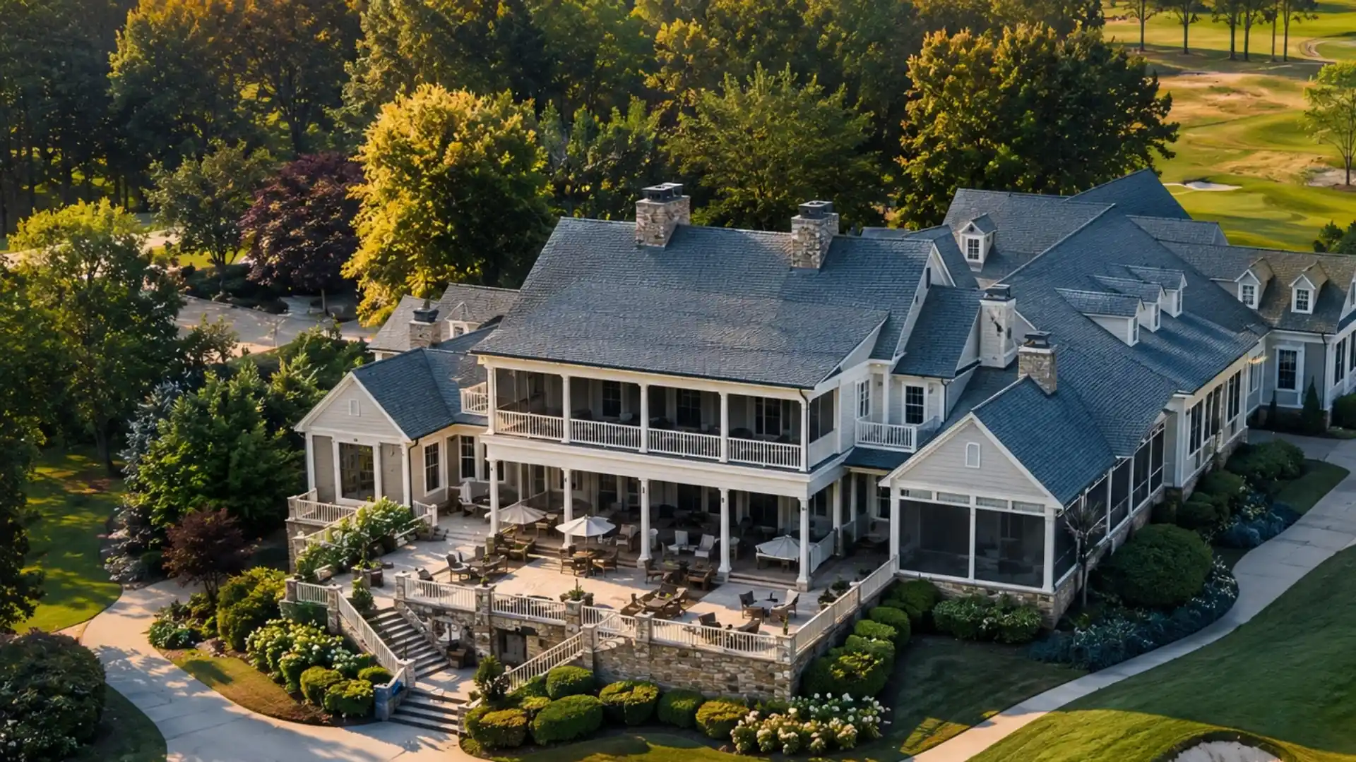 Luxury outdoor living estate home in Milton GA with screened porches, covered patios, and expansive backyard entertaining spaces.