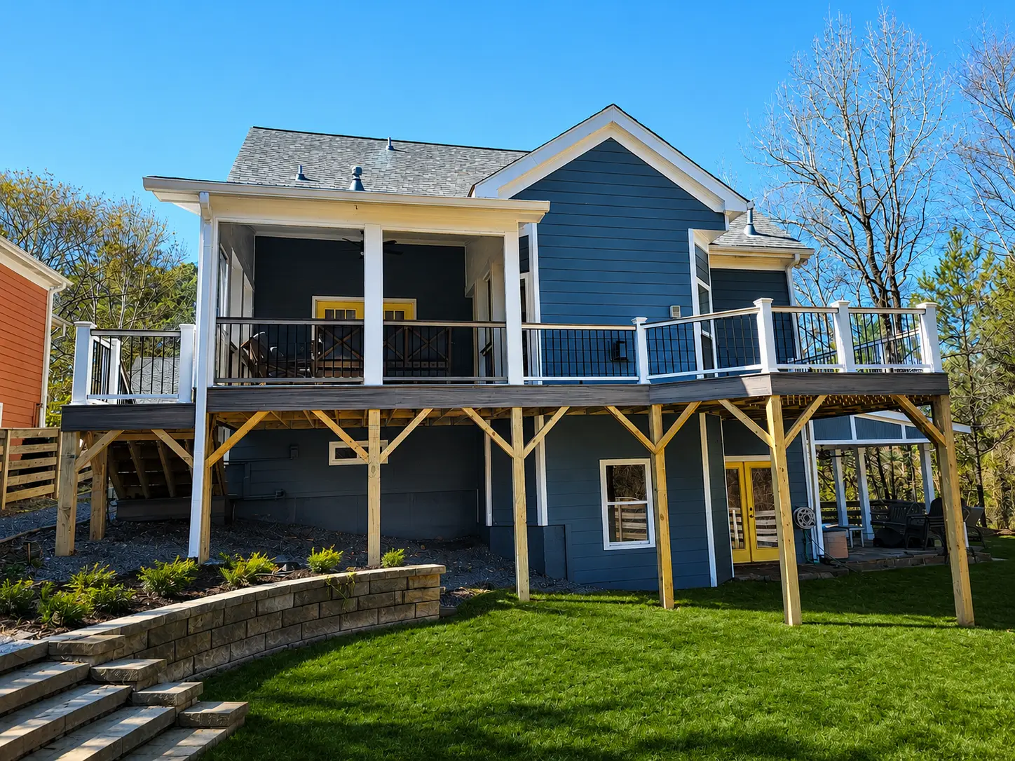 Premium composite deck and screened porch renovation in North Atlanta by Yanover Construction.