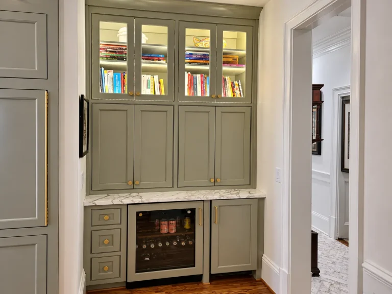 Built-in beverage bar with custom gray cabinetry and wine refrigerator in a Buckhead kitchen remodel.